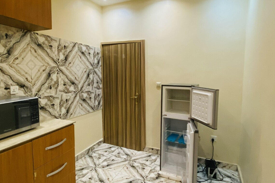 kitchen view with fridge
